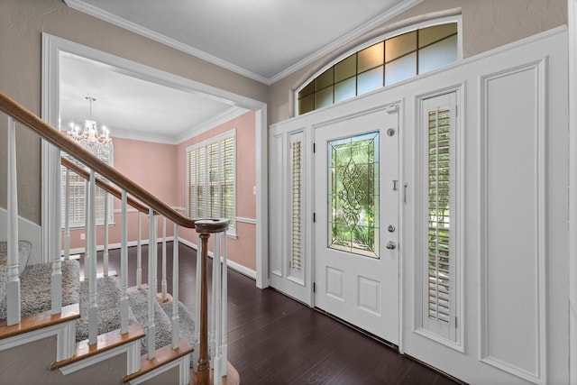 62 Treescape Cir, The Woodlands, TX 77381 - foyer featuring dark wood finished floors, stairs, crown molding, a chandelier, and baseboards