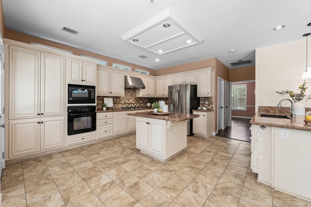 62 Treescape Cir, The Woodlands, TX 77381 - kitchen with black appliances, exhaust hood, dark stone countertops, decorative backsplash, and a sink