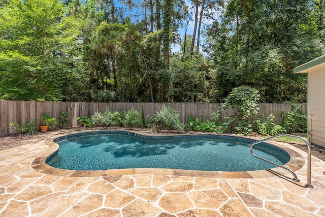 62 Treescape Cir, The Woodlands, TX 77381 - view of swimming pool with a fenced backyard and a patio