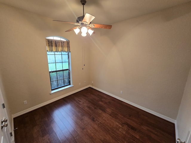 1008 Heritage Oaks Dr, Angleton, TX 77515 - unfurnished room featuring a ceiling fan, baseboards, and dark wood-style floors