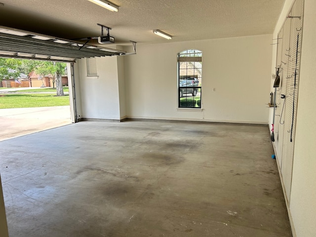 1008 Heritage Oaks Dr, Angleton, TX 77515 - garage featuring a garage door opener