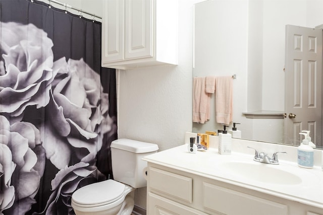 17218 Marquette Point Ln, Humble, TX 77346 - full bathroom featuring vanity, toilet, and a shower with shower curtain