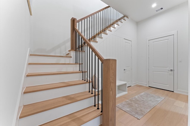 432 W 24th St, Houston, TX 77008 - stairway featuring wood finished floors