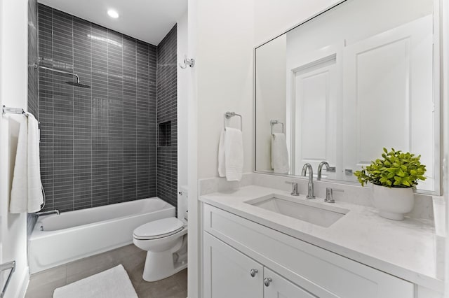 432 W 24th St, Houston, TX 77008 - bathroom with vanity, toilet, washtub / shower combination, tile patterned flooring, and recessed lighting