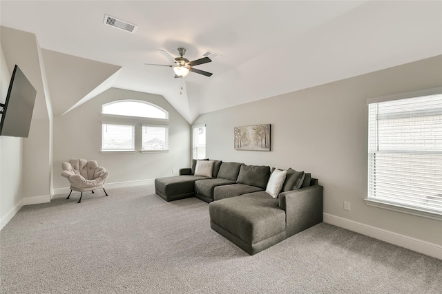 18115 Bachman Branch Dr, Cypress, TX 77433 - living room featuring a ceiling fan, carpet flooring, baseboards, and lofted ceiling