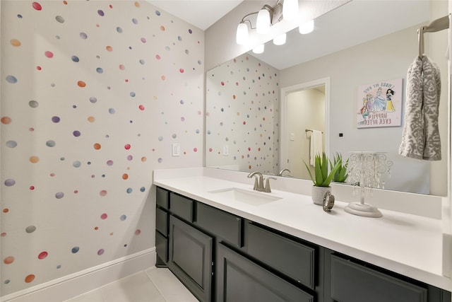 18115 Bachman Branch Dr, Cypress, TX 77433 - bathroom featuring vanity, tile patterned flooring, wallpapered walls, and baseboards