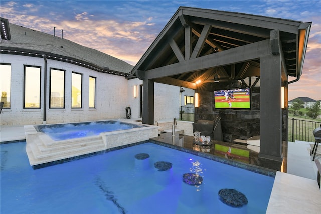 18115 Bachman Branch Dr, Cypress, TX 77433 - view of swimming pool featuring a gazebo, a pool with connected hot tub, and a patio