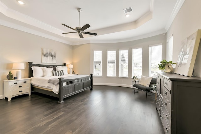 18115 Bachman Branch Dr, Cypress, TX 77433 - bedroom with a tray ceiling, ornamental molding, dark wood-style flooring, recessed lighting, and baseboards
