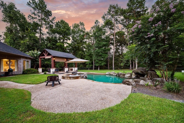 10250 Clubhouse Cir, Magnolia, TX 77354 - view of pool with a patio, view of wooded area, a gazebo, and a pool with connected hot tub