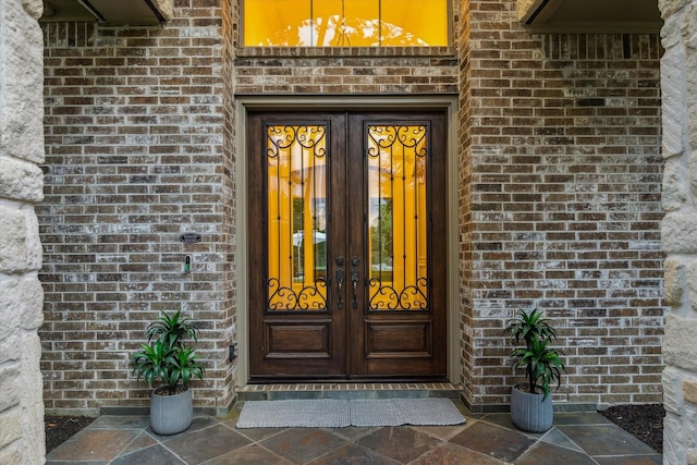 10250 Clubhouse Cir, Magnolia, TX 77354 - doorway to property with french doors and brick siding