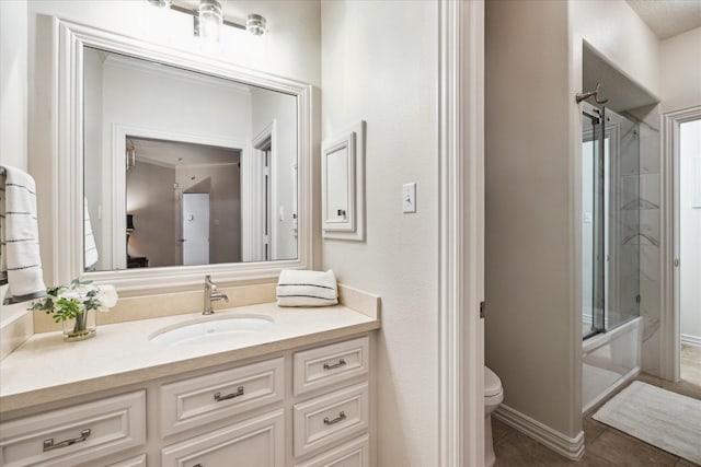 10250 Clubhouse Cir, Magnolia, TX 77354 - full bath featuring vanity, toilet, an enclosed shower, and tile patterned flooring