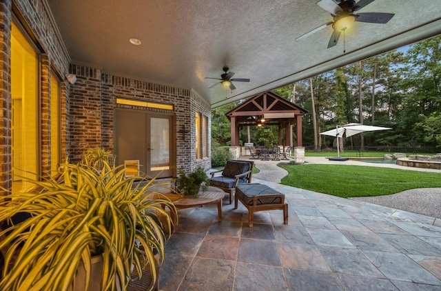 10250 Clubhouse Cir, Magnolia, TX 77354 - view of patio with ceiling fan and a gazebo