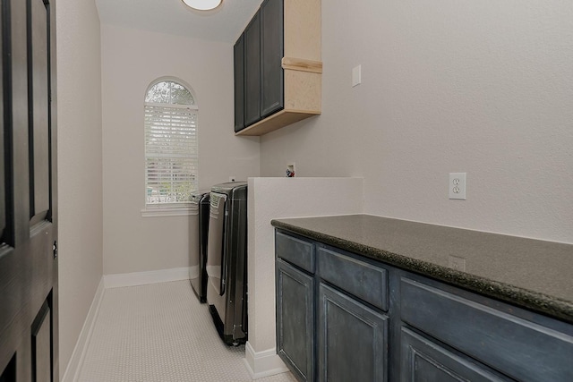 43 Danville Crossing Ct, The Woodlands, TX 77385 - washroom with washer and clothes dryer and baseboards