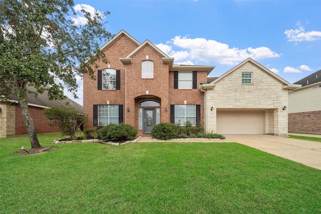 13909 Stonewood Ct, Rosharon, TX 77583 - view of front facade with concrete driveway, a front lawn, a garage, brick siding, and stone siding