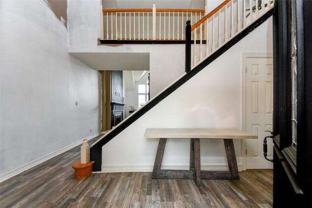 23214 Gatecreek Ct, Katy, TX 77494 - stairs featuring baseboards and wood finished floors