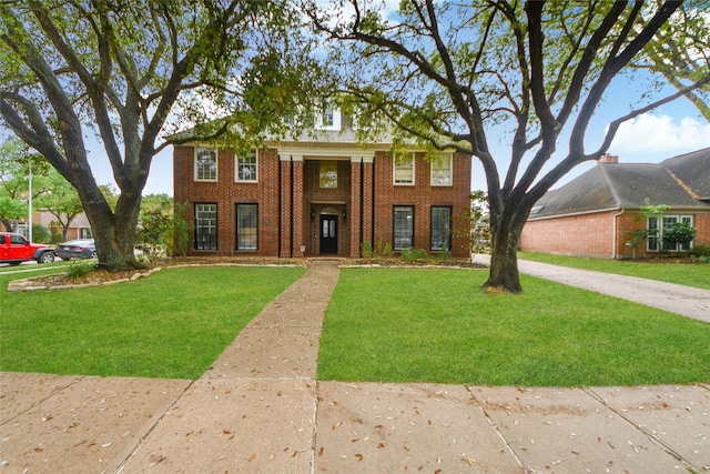 23214 Gatecreek Ct, Katy, TX 77494 - view of front of house with brick siding and a front lawn