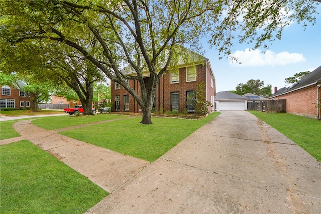 23214 Gatecreek Ct, Katy, TX 77494 - colonial-style house with brick siding and a detached garage