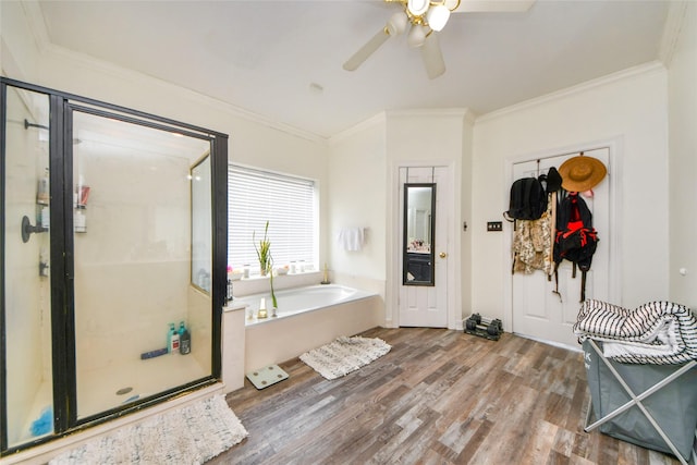 23214 Gatecreek Ct, Katy, TX 77494 - full bath with a ceiling fan, a stall shower, a garden tub, crown molding, and wood finished floors