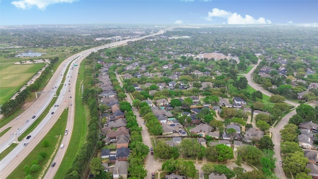 23214 Gatecreek Ct, Katy, TX 77494 - aerial view of property's location with a highway, nearby suburban area, and a large body of water