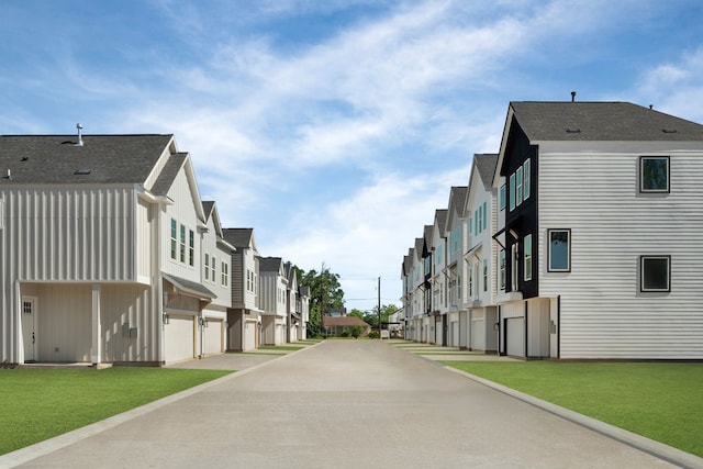 5832 Highland Sun Ln, Houston, TX 77091 - view of concrete road featuring a residential view