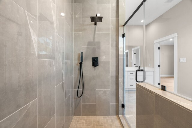 5835 Highland Sun Ln, Houston, TX 77091 - bathroom with a stall shower and recessed lighting