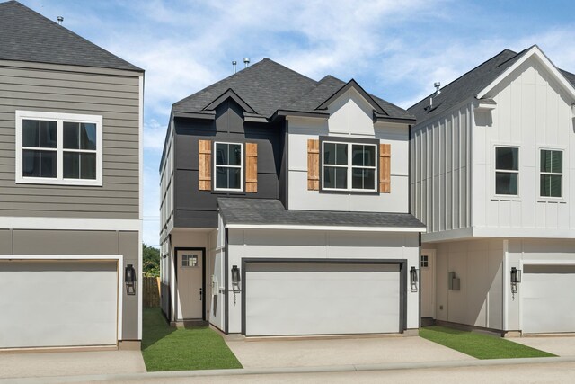 5835 Highland Sun Ln, Houston, TX 77091 - view of front of house with an attached garage, driveway, and roof with shingles