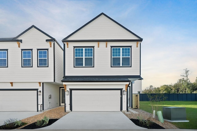 5835 Highland Sun Ln, Houston, TX 77091 - view of front of house featuring an attached garage and concrete driveway