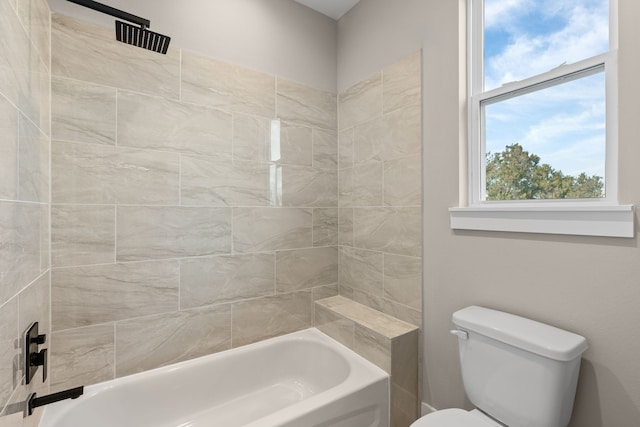 5833 Highland Sun Ln, Houston, TX 77091 - bathroom featuring toilet and shower / washtub combination