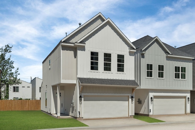 5833 Highland Sun Ln, Houston, TX 77091 - view of front facade with a shingled roof, a garage, driveway, and board and batten siding