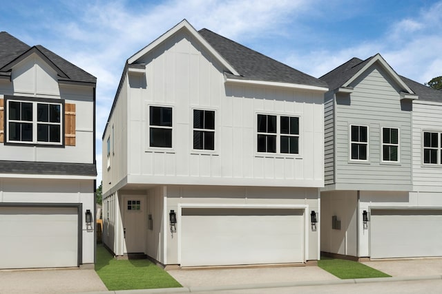 5833 Highland Sun Ln, Houston, TX 77091 - view of front of home with board and batten siding, a garage, concrete driveway, and a shingled roof