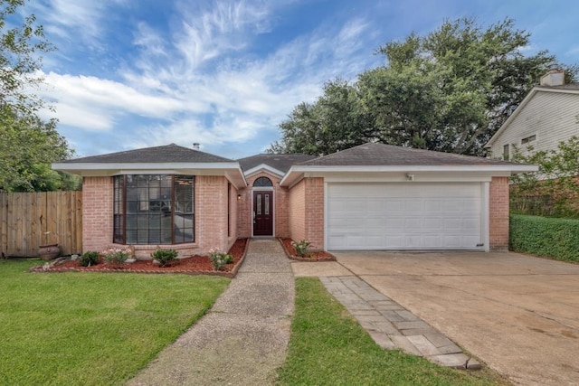 10603 Zircon Ct, Houston, TX 77099 - view of front facade with brick siding, concrete driveway, a garage, and french doors