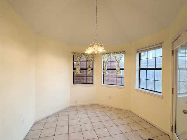 8631 Mapletwist St, Houston, TX 77083 - unfurnished dining area with a chandelier, vaulted ceiling, baseboards, and light tile patterned floors