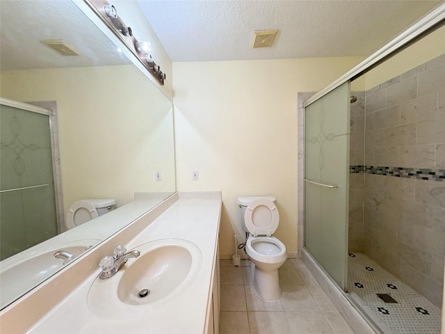 8631 Mapletwist St, Houston, TX 77083 - full bath with toilet, a shower stall, tile patterned flooring, vanity, and a textured ceiling