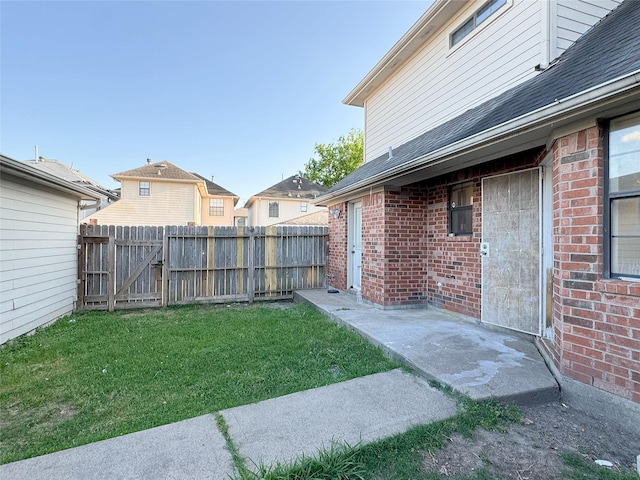 8631 Mapletwist St, Houston, TX 77083 - view of yard with a gate and a patio