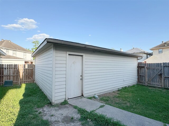 8631 Mapletwist St, Houston, TX 77083 - view of outdoor structure featuring a gate