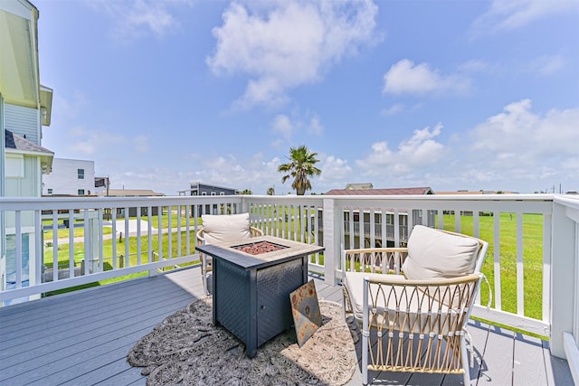 4101 5th St, Galveston, TX 77554 - wooden terrace with a fire pit and a yard