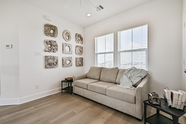4101 5th St, Galveston, TX 77554 - living room featuring light wood-type flooring, baseboards, a ceiling fan, and recessed lighting