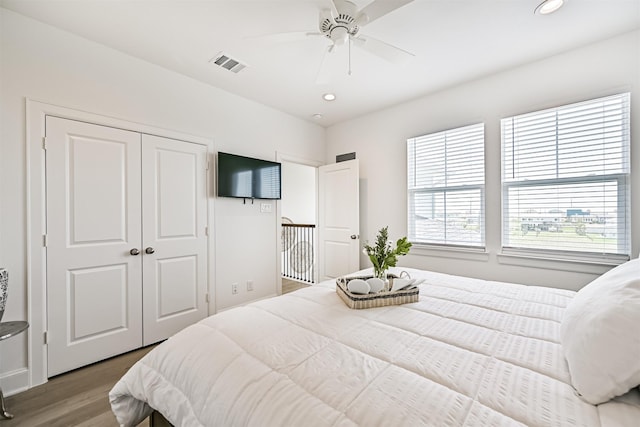 4101 5th St, Galveston, TX 77554 - bedroom with wood finished floors, recessed lighting, a closet, and a ceiling fan
