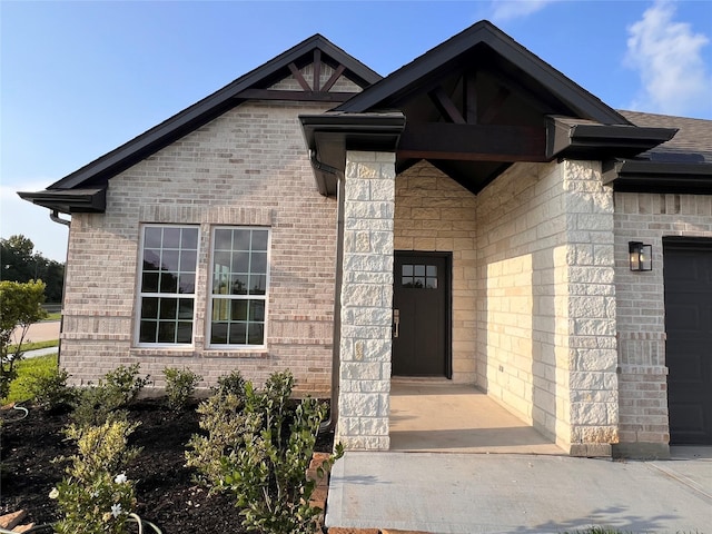 15826 Sugar Maple Ln, Santa Fe, TX 77517 - property entrance featuring brick siding and roof with shingles