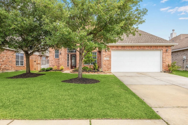 9110 Kinnel Ln, Tomball, TX 77375 - view of property hidden behind natural elements with driveway, brick siding, an attached garage, and roof with shingles