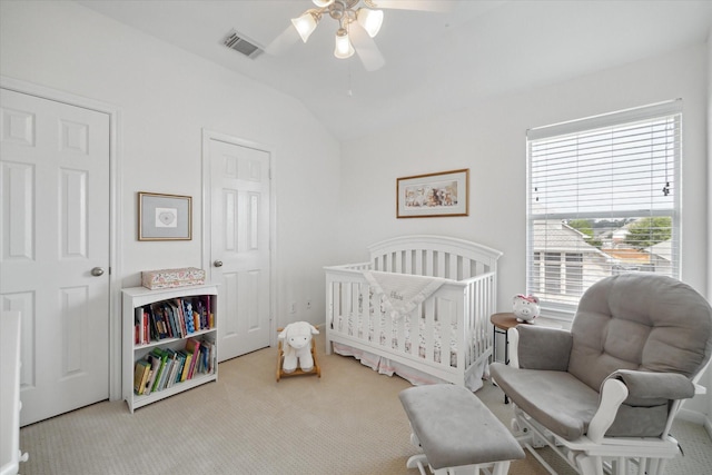 9110 Kinnel Ln, Tomball, TX 77375 - bedroom with carpet, a crib, vaulted ceiling, and ceiling fan