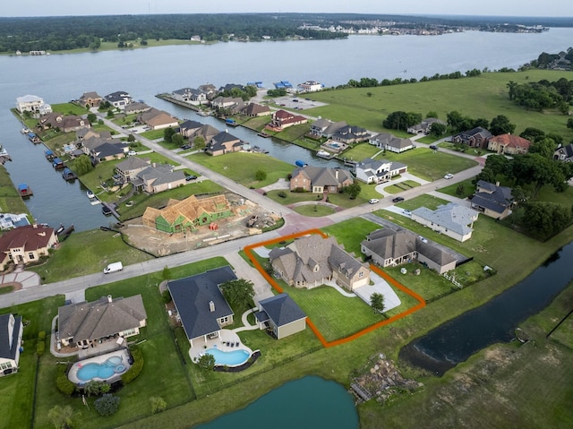 10887 Decatur St, Willis, TX 77318 - aerial overview of property's location featuring a large body of water, nearby suburban area, and property boundaries highlighted