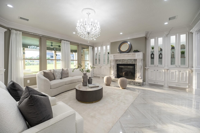 10887 Decatur St, Willis, TX 77318 - living room featuring ornamental molding, a chandelier, recessed lighting, and a premium fireplace