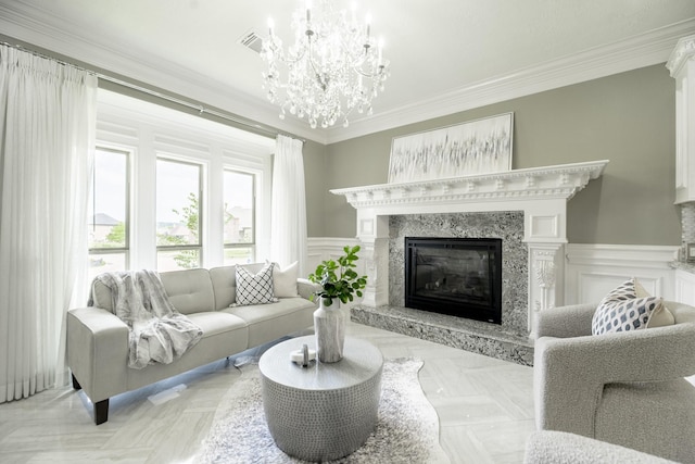 10887 Decatur St, Willis, TX 77318 - living area with ornamental molding, a fireplace, a chandelier, and wainscoting