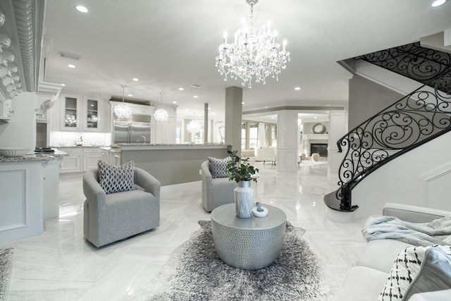 10887 Decatur St, Willis, TX 77318 - living area with recessed lighting, a chandelier, and stairway