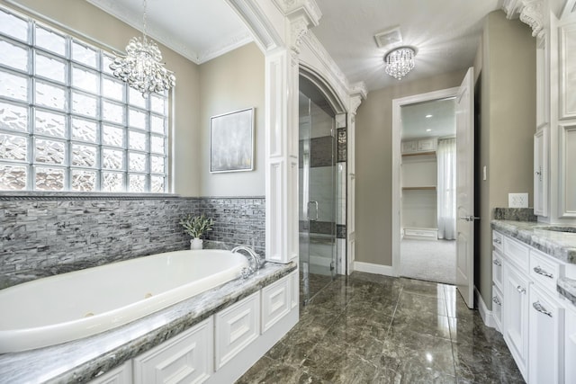 10887 Decatur St, Willis, TX 77318 - bathroom featuring a chandelier, a tub with jets, a stall shower, and vanity
