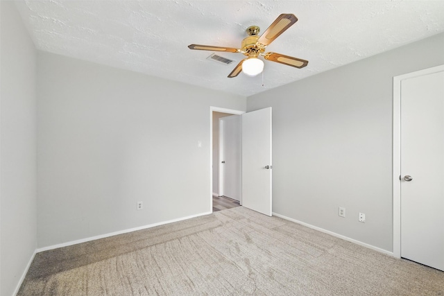 10119 Peachridge Dr, Houston, TX 77070 - unfurnished room with carpet floors, a ceiling fan, and baseboards