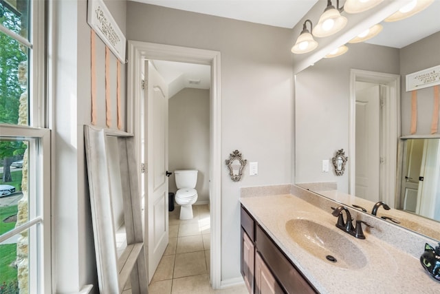 13803 Oak Fair Bnd, Cypress, TX 77429 - bathroom featuring vanity, tile patterned floors, and toilet
