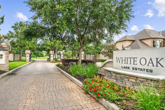 13803 Oak Fair Bnd, Cypress, TX 77429 - view of road with curbs and a gated entry