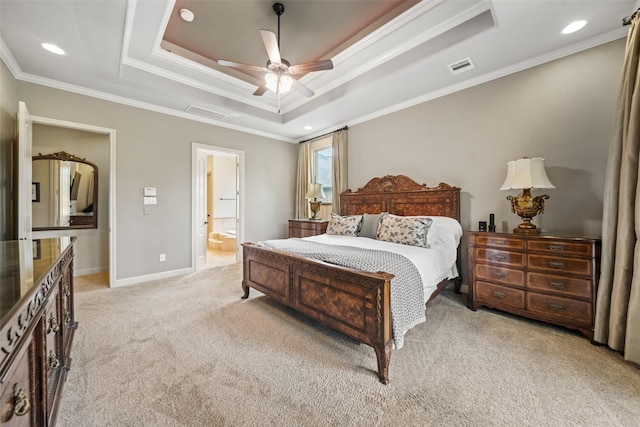 13803 Oak Fair Bnd, Cypress, TX 77429 - bedroom featuring light colored carpet, a tray ceiling, ensuite bathroom, crown molding, and baseboards